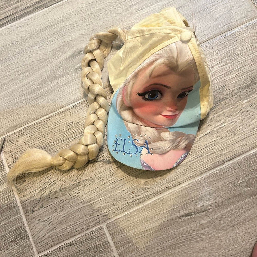 Disney Frozen Elsa cap with long braid.